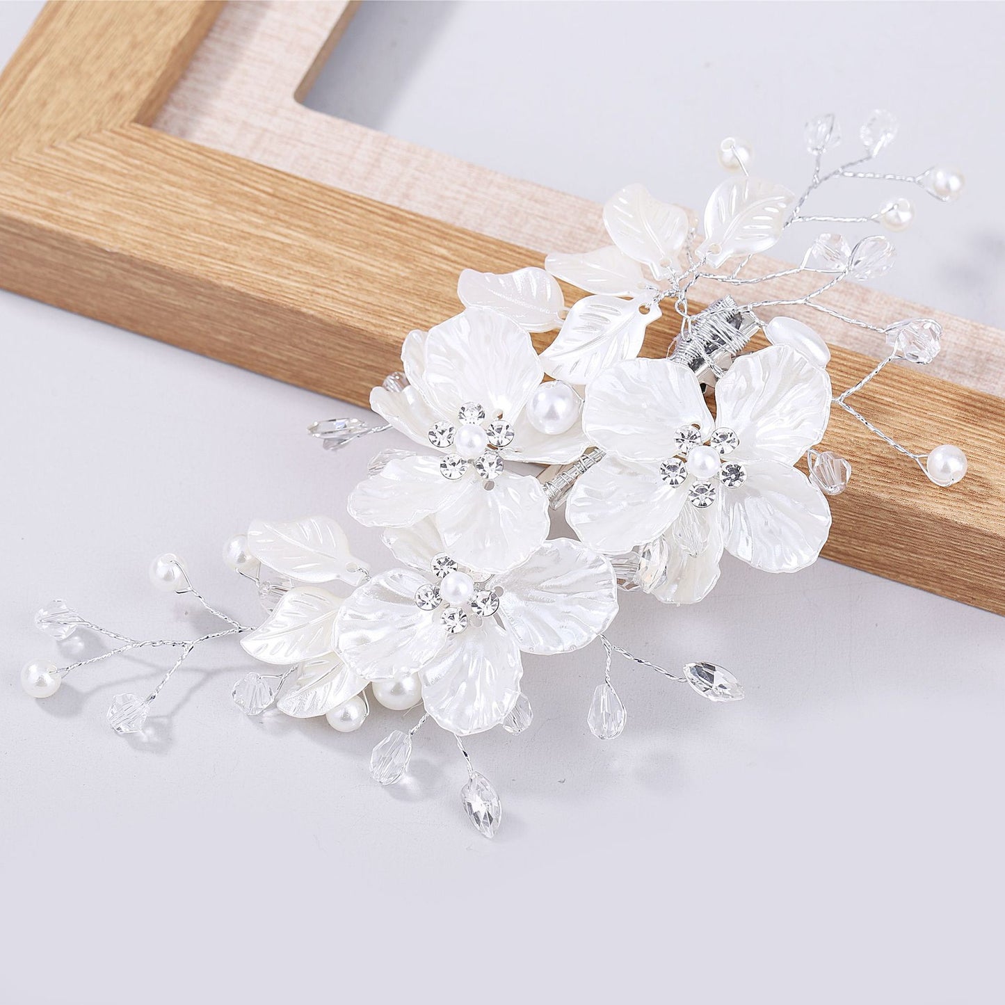 Pearl and Crystal Wedding Hair Clip with Shell Petal Design