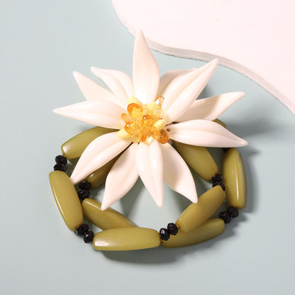 Layered Bracelet With White Resin Flower Pendant
