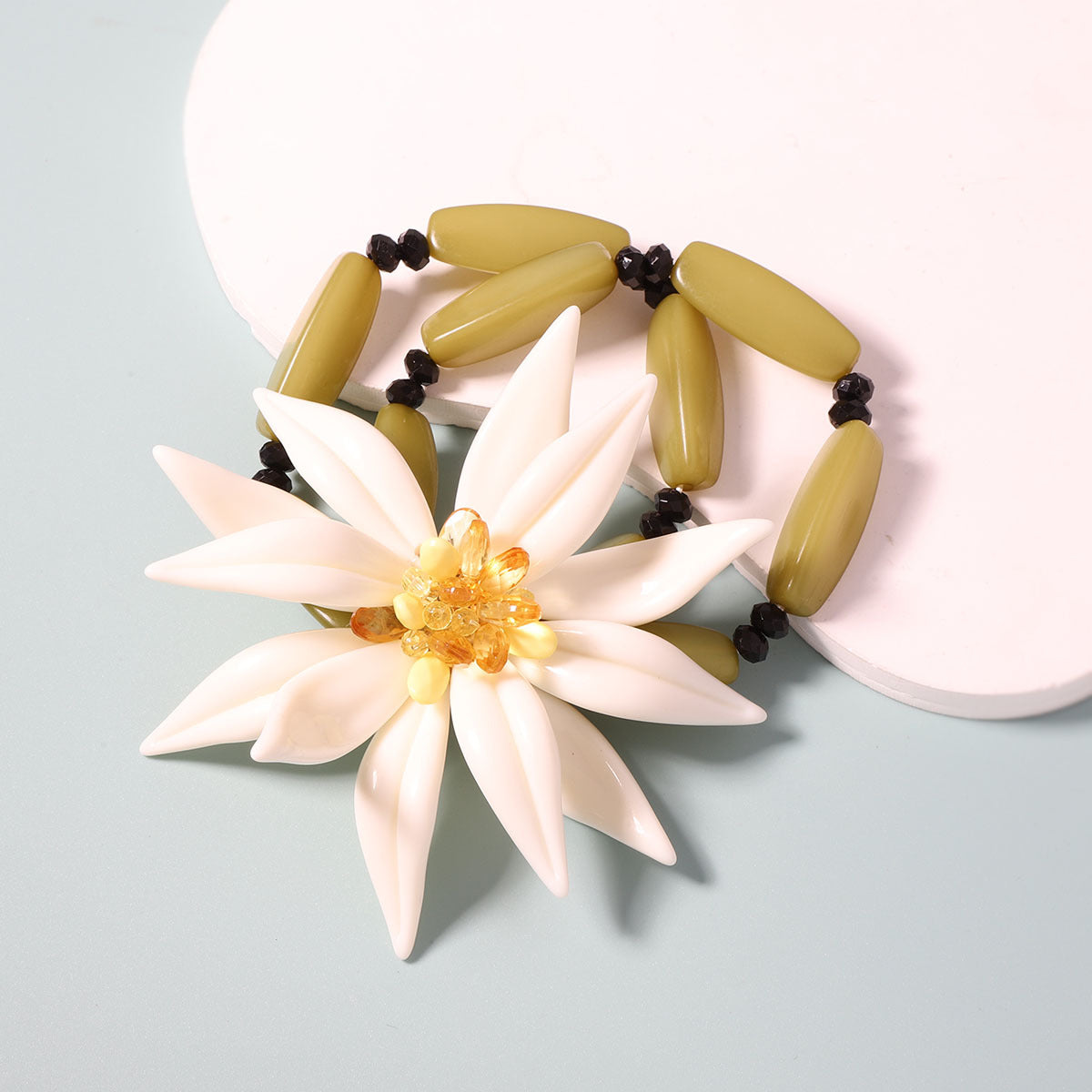 Layered Bracelet With White Resin Flower Pendant